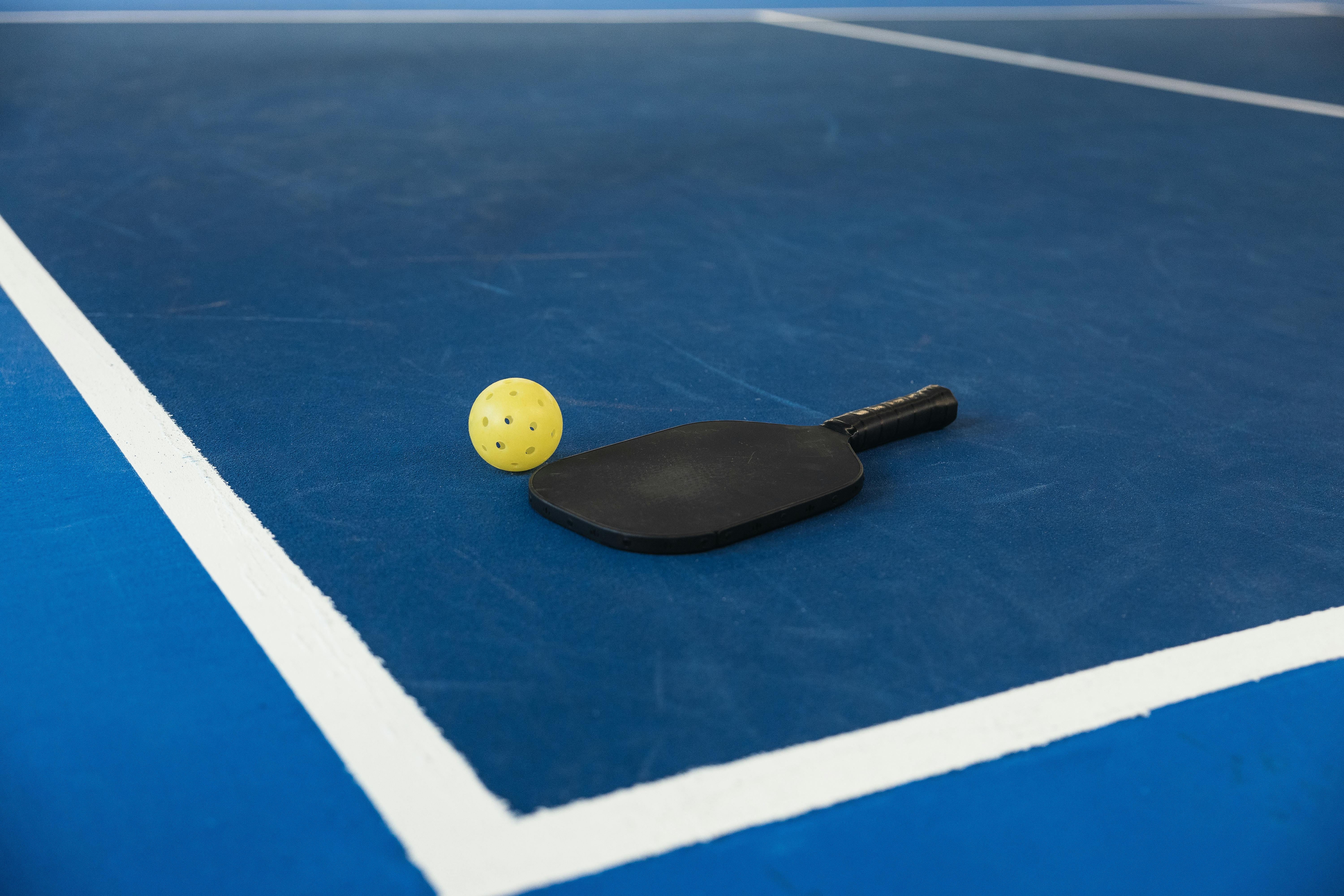 Pickleball paddle and court